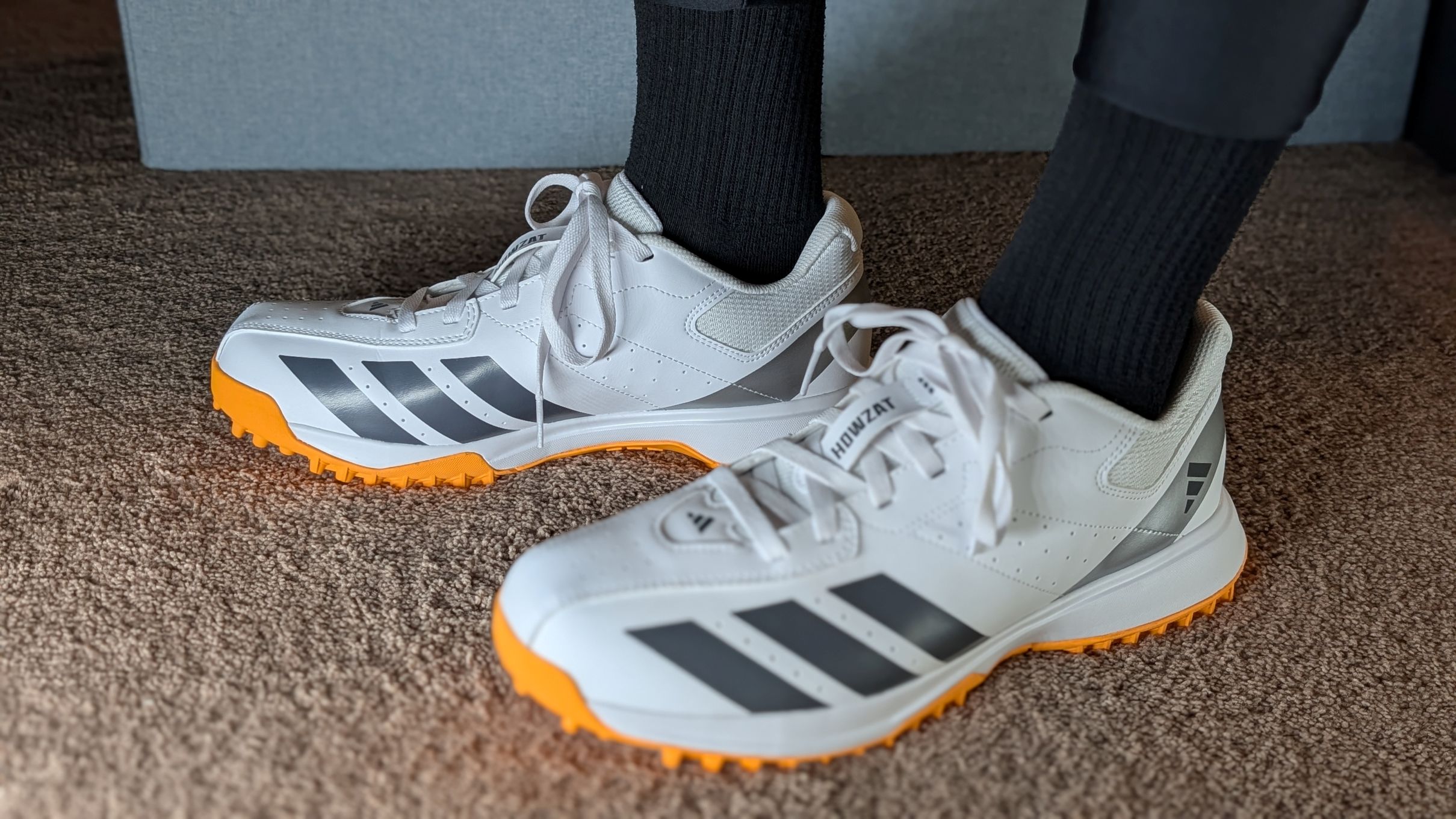 White and orange Adidas Howzat Spikeless Cricket Shoes Review on-feet