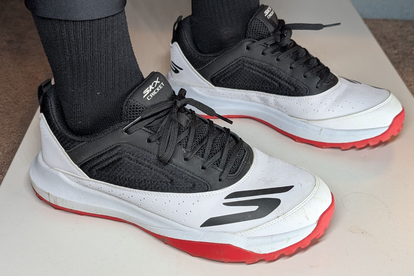 Red white and black men's skechers turf cricket shoes on feet product review