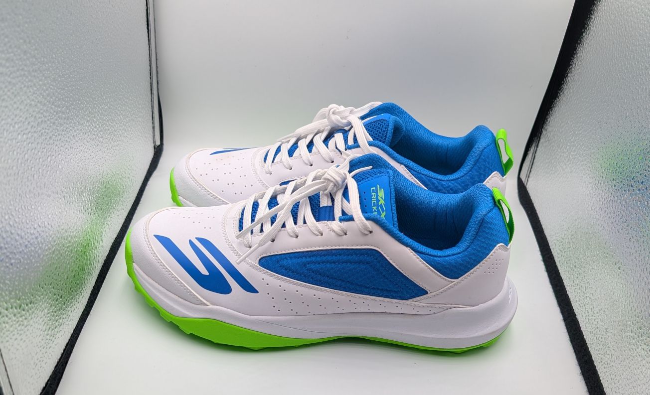 Blue and green Skechers rubber spike cricket shoes
