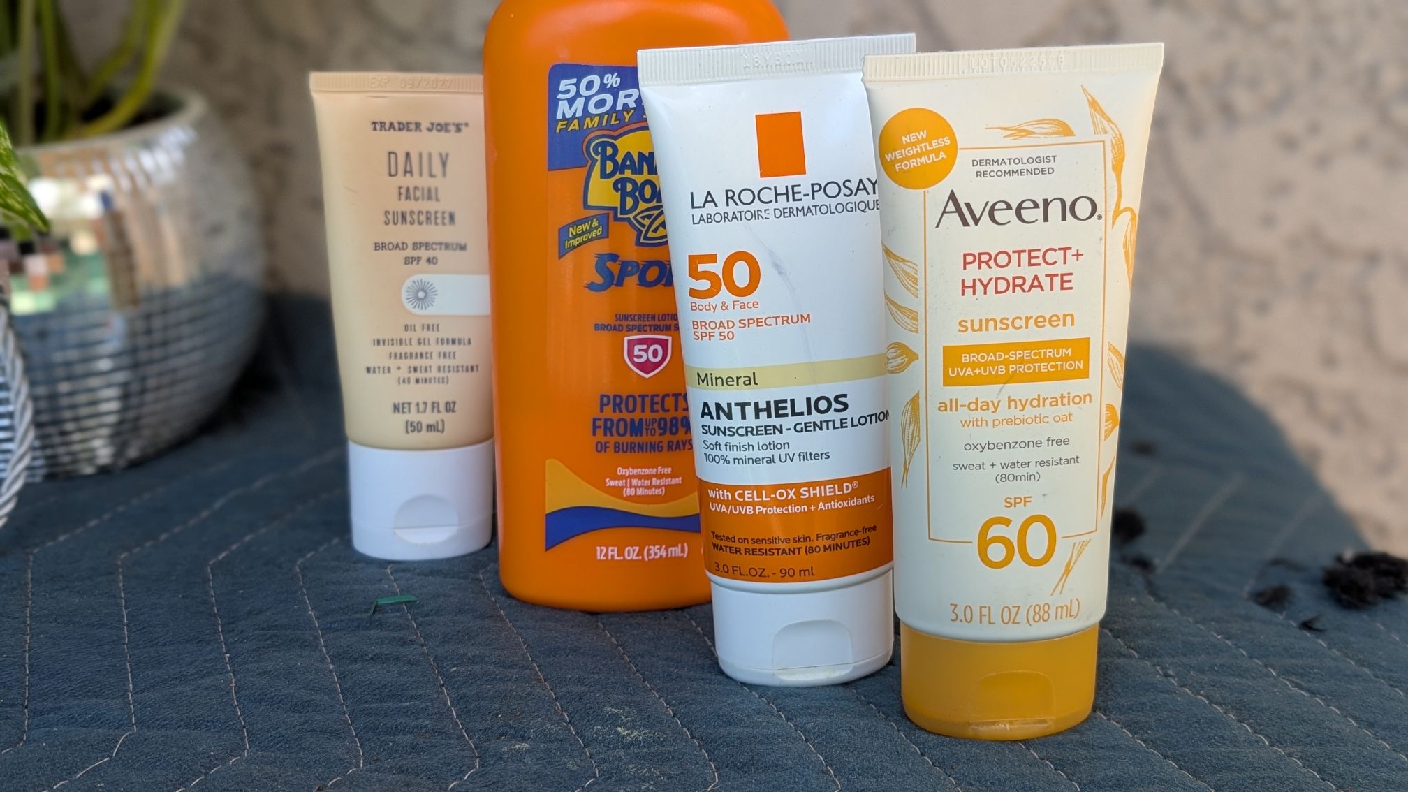 Sunscreen bottles lined up for health and wellness products testing for reviews