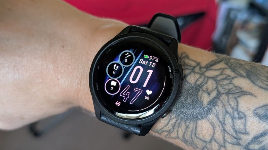 Garmin Forerunner 265 Running Watch Custom Purple face on wrist with tattoos