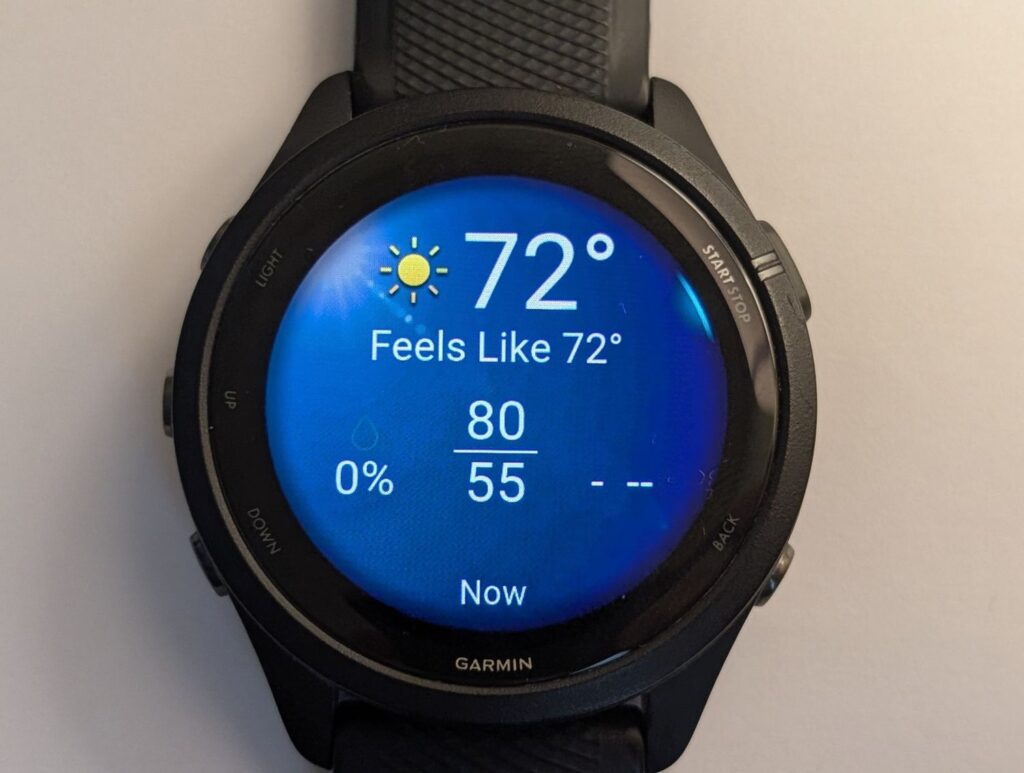 Garmin Forerunner 265 watch blue weather glance home screen