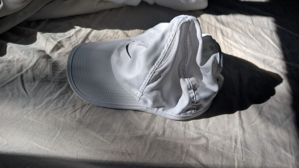 NIke Dri-FIT Unstructured Featherlight Cap side view showing lightweight crown