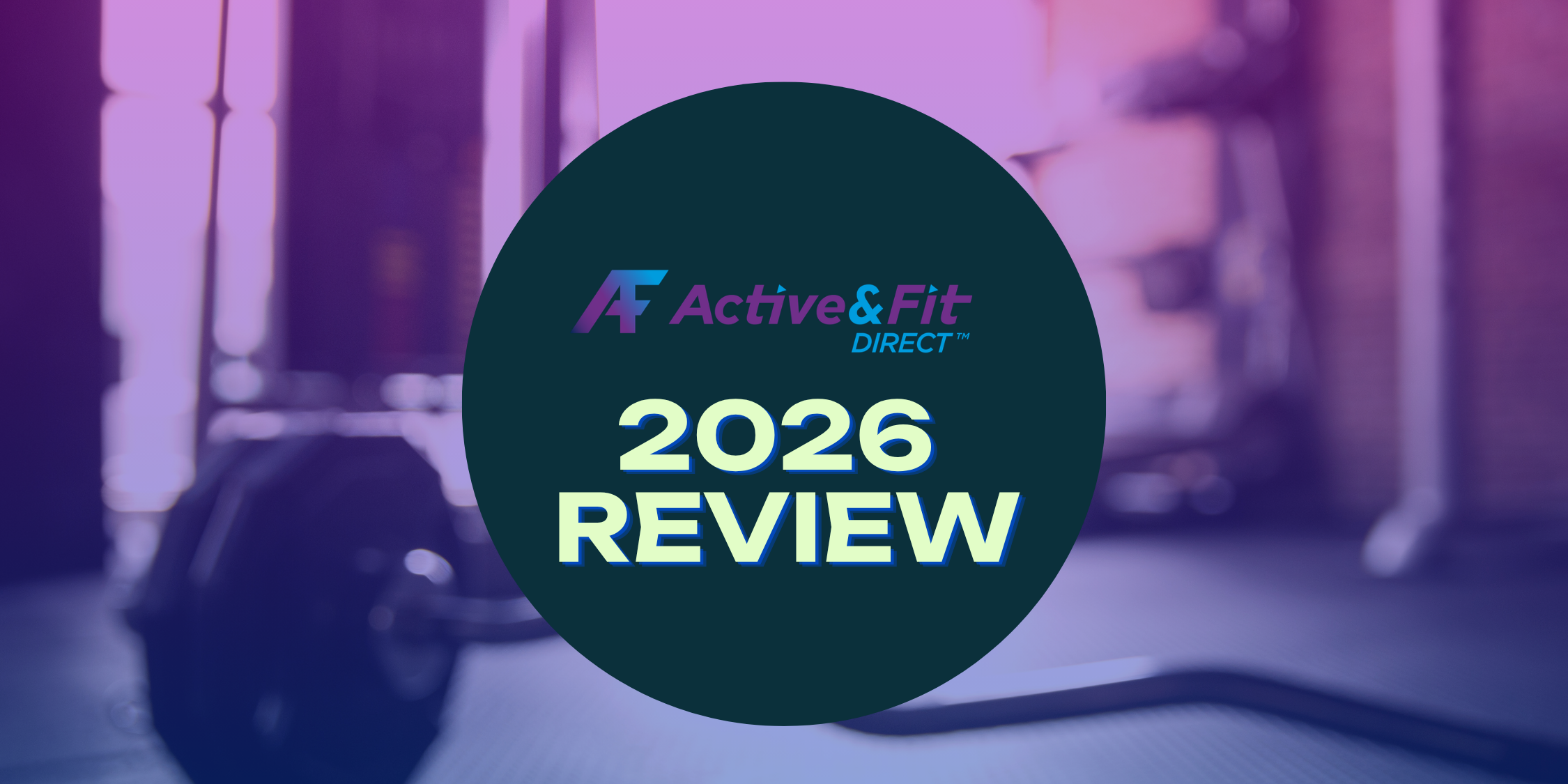 Active and Fit Direct 2026 Review in circle over gym equipment in background