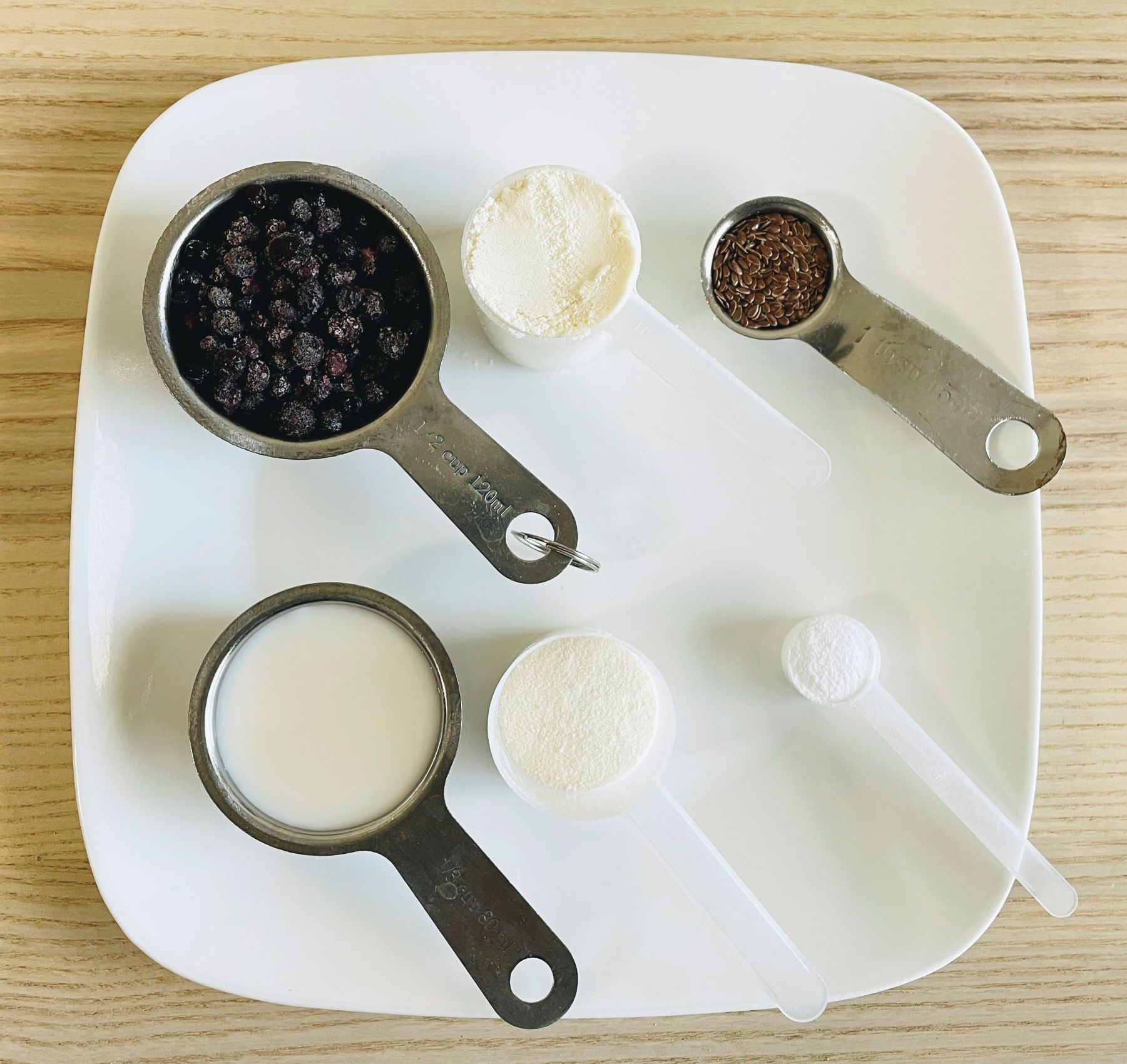 High Protein Smoothie Recipe ingredients measured on a plate
