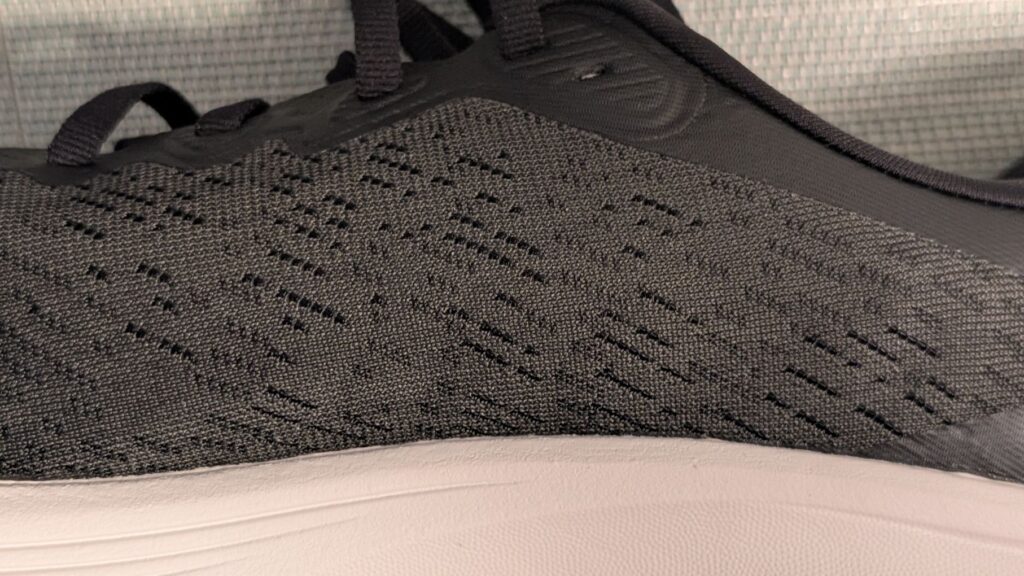Close up of Hoka Solimar 2 premium mesh upper in black 