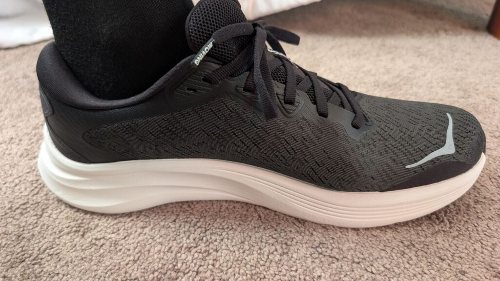 Medial view of black and white gym shoe