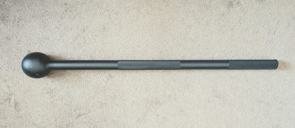 Black macebell used as cricket training equipment for shoulder strength