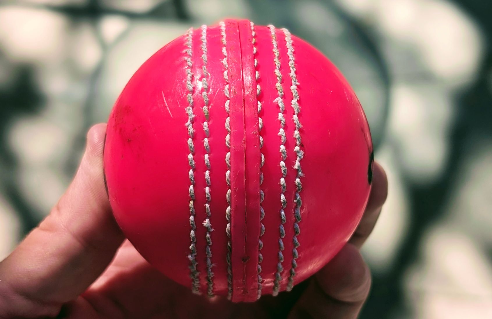 Pink synthetic cricket ball review with six stitched strings review