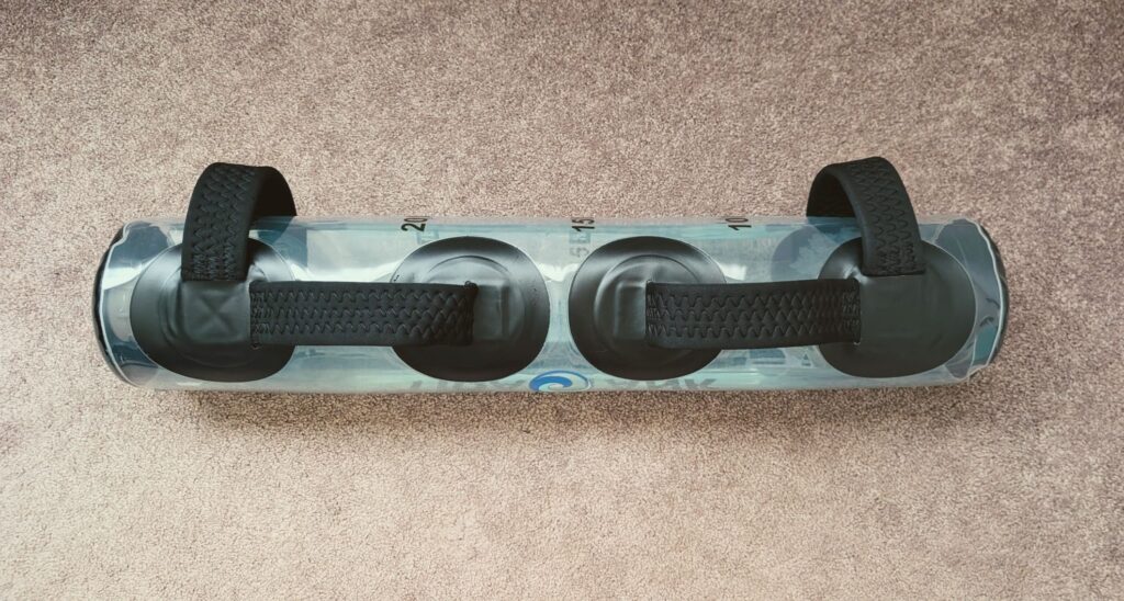 Tidal tank water bag set on floor for use as balance and strength cricket training equipment