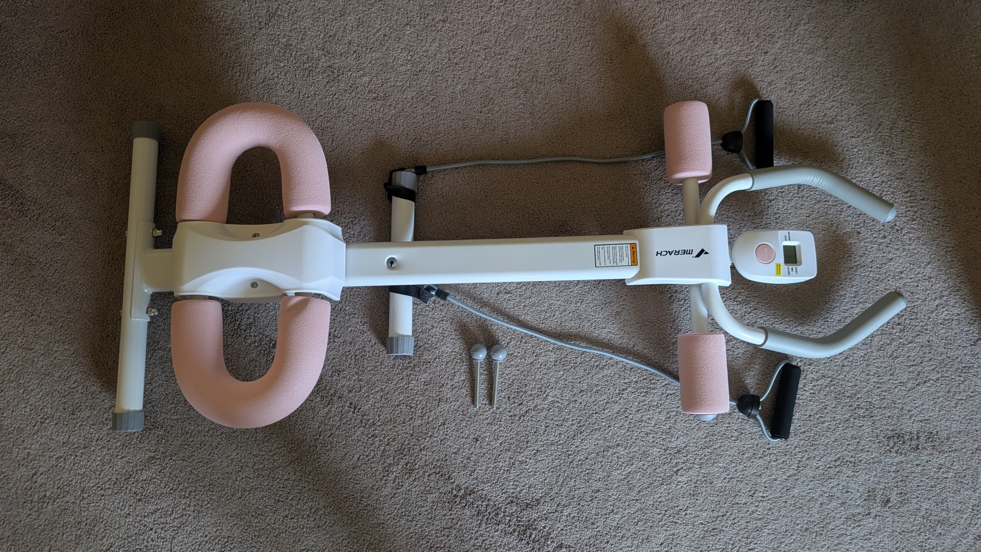 MERACH Ab Machine review showing MR-2314 folded in home gym