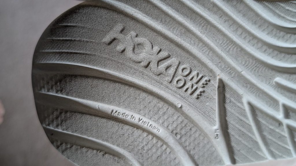 Hoka One One logo on bottom of shoe