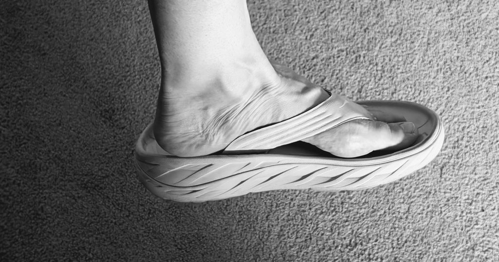 Size 10D Hoka sandal on foot