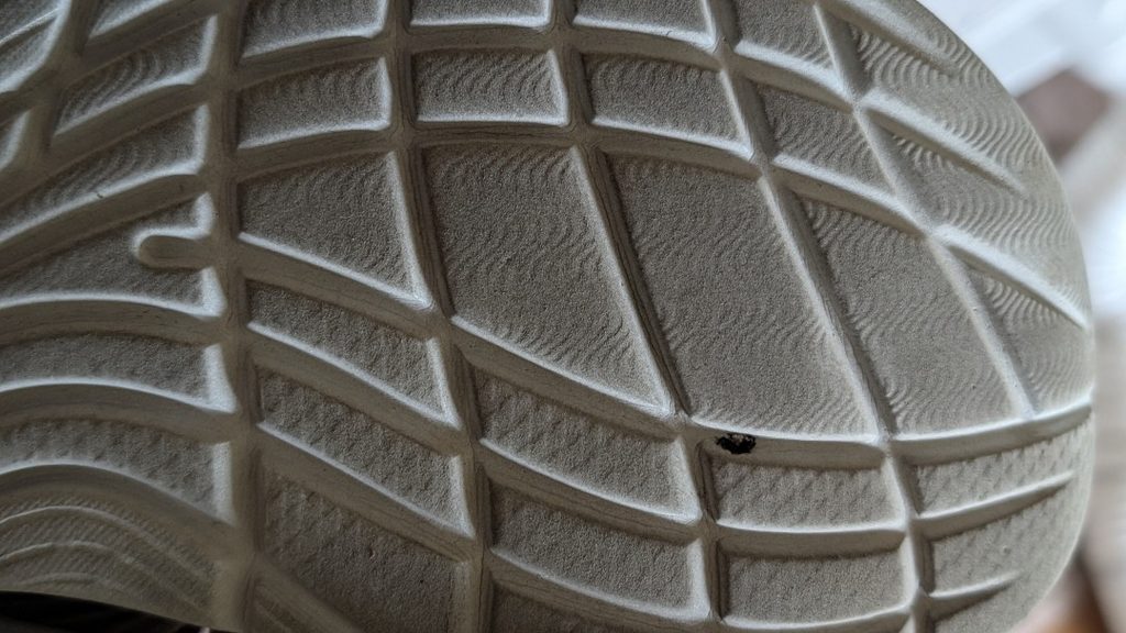 Rubber outsole on white Hoka Ora Recovery Flip Flops